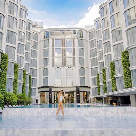 The Salil Hotel Riverside Bangkok Dış mekan fotoğraf The hotel's courtyard